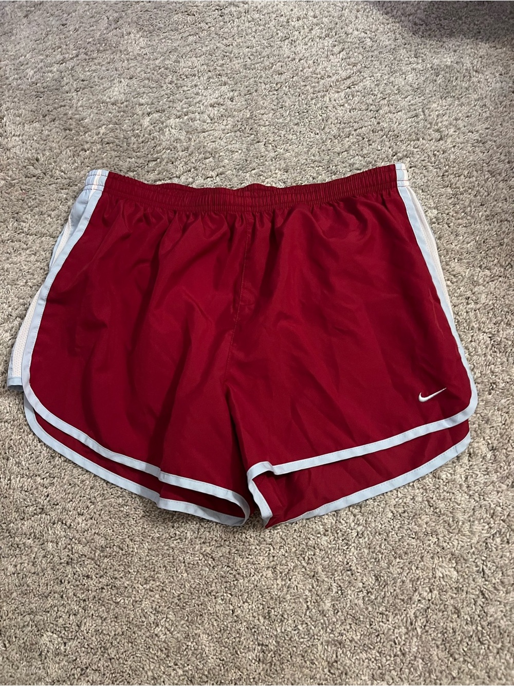 Nike Women’s Red Running Shorts with White & light Blue Trim. Size L